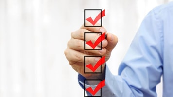 Compliance, businessman checking final mark on checklis