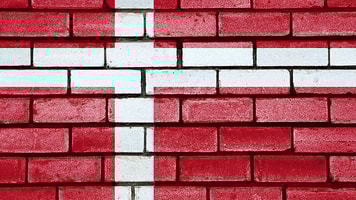 Denmark flag painted on brick wall