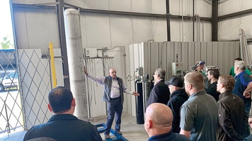 RGB_photo was taken at our Cylinder Filling Operations Seminar in October.  Maynard “Bud” Klotz is in the photo.  He’s our Vice President.  And he Image was explaining the Argon Maximizer