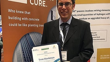 sean-monkman-with-certificate-index