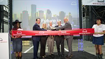 THE OFFICIAL RIBBON-CUTTING