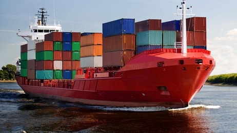 1028225_cargo-container-ship-freighter-navigating-river-Distribution