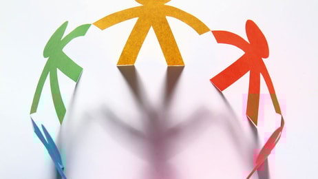 figures holding hands