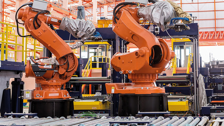 industrial welding robots in production line manufacturer factory