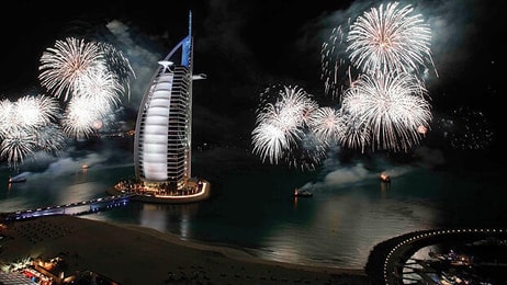 Fireworks light up the Burj Al Arab, from the Jumeirah Beach Hotel