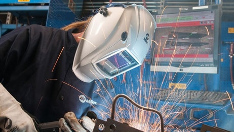 man welding