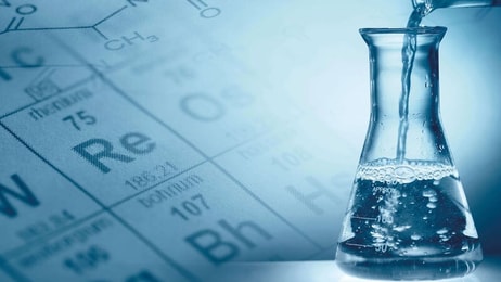 Spec-gases-Laboratory-Science-concept-Pouring-liquid-into-flask