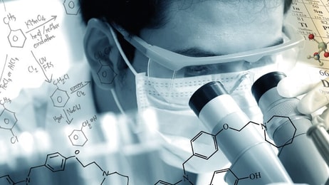 Spec-gases-Laboratory-chemist-using-microscope-to-analyze-the-sample-in-laboratory