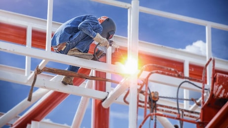 Workers-welding-steel-structures-with-lifter-and-hight-area