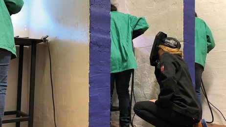 Samantha Farr is observing participants as they gas metal arc weld during an intensive training program_©2019 Women Who Weld®