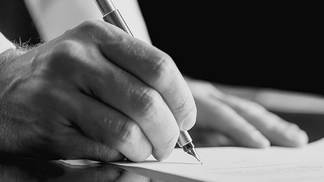 Signing contract close up