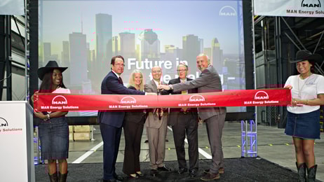 THE OFFICIAL RIBBON-CUTTING